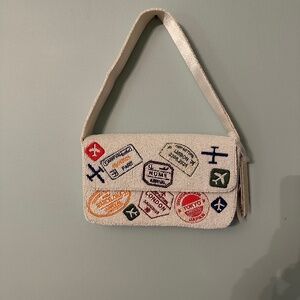 Update : SOLD Viral passport/travel beaded bag